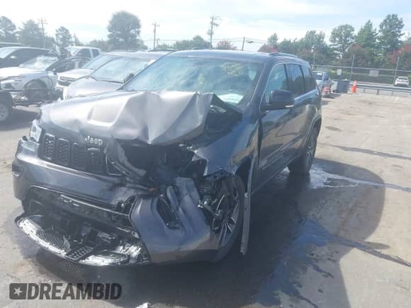 2021 Jeep Grand Cherokee 80th Anniversary with VIN 1C4RJEBG8MC636293, listed as a IAAI auction lot 42898455 with 82,338 mi miles and . Bid and sale history available at DreamBid. Image 2.