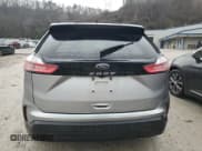 ✅ 2021 Ford Edge SE • VIN: 2FMPK4G94MBA04511 • Lot: 84423524. Wystawiony na Copart z przebiegiem 162 699 mil. Bezpłatny archiwum sprzedaży aukcyjnych z USA i szczegółowy raport historii pojazdu na DreamBid. Zdjęcie 6.