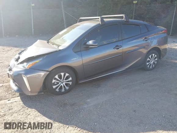 2022 Toyota Prius LE z VIN JTDL9MFU2N3034161, wystawiony jako IAAI lot #43081775 z przebiegiem 63 531 mil mil oraz . Historia ofert i sprzedaży dostępna na DreamBid. Obrazek 2.
