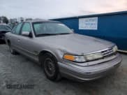 ✅ 1995 Ford Crown Victoria LX • VIN: 2FALP74W2SX109926 • Lot: 77365174. Listed on Copart with 192,333 mi. Free auction sales archive from the USA and detailed vehicle history report at DreamBid. Image 4.