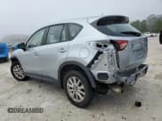 ✅ 2016 Mazda CX-5 Sport • VIN: JM3KE4BYXG0773984 • Lot: 80198194. Listed on Copart with 137,391 mi. Free auction sales archive from the USA and detailed vehicle history report at DreamBid. Image 2.