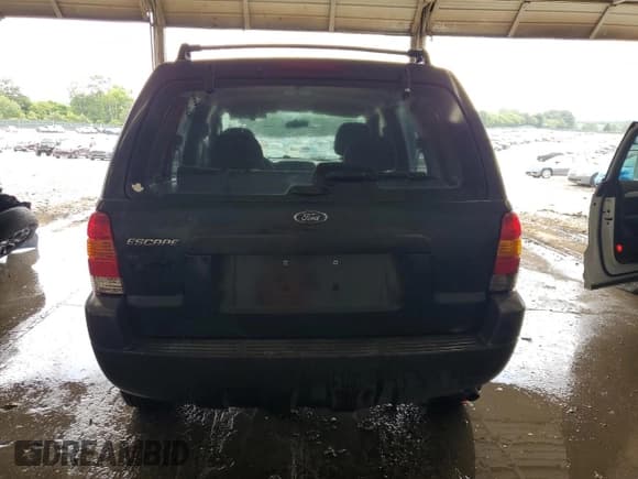 ✅ 2003 Ford Escape XLS Popular • VIN: 1FMYU92153KB77407 • Lot: 62953535. Listed on Copart with 209,286 mi. Free auction sales archive from the USA and detailed vehicle history report at DreamBid. Image 6.
