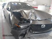 ✅ 2021 Mazda 3 Premium • VIN: JM1BPAML3M1310609 • Лот: 43219103. Опубликован ранее на IAAI с пробегом 56 157 миль. Бесплатный доступ к архиву аукционных продаж из США и подробный отчёт об истории автомобиля на DreamBid. Изображение 6.