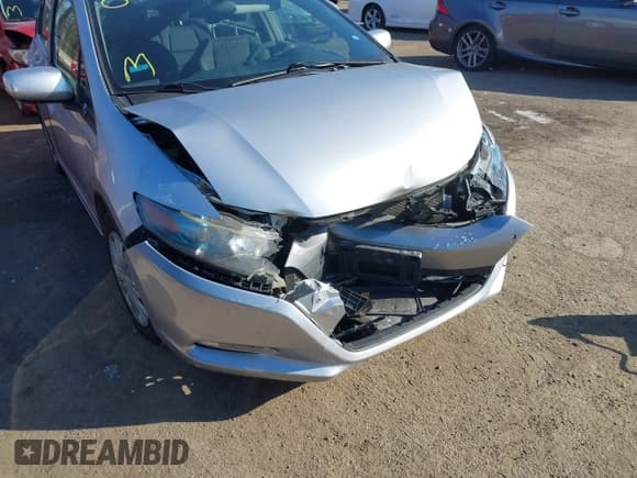 ✅ 2010 Honda Insight LX • VIN: JHMZE2H52AS021621 • Lot: 41375852. Listed on IAAI with 214,635 mi. Free auction sales archive from the USA and detailed vehicle history report at DreamBid. Image 6.