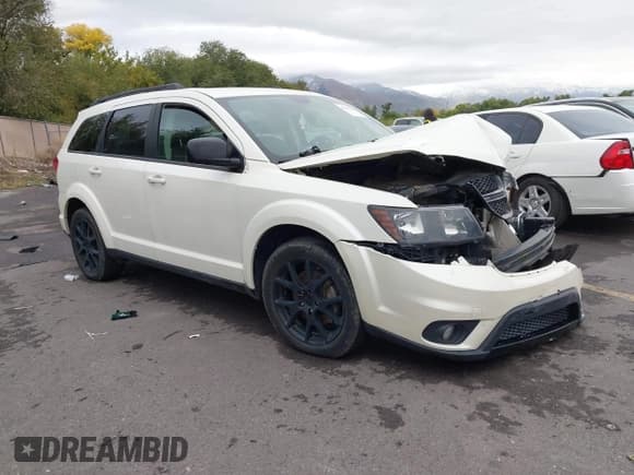 ✅ 2014 Dodge Journey SXT • VIN: 3C4PDDBGXET122394 • Lot: 43454343. Listed on IAAI with 99,180 mi. Free auction sales archive from the USA and detailed vehicle history report at DreamBid. Image 1.