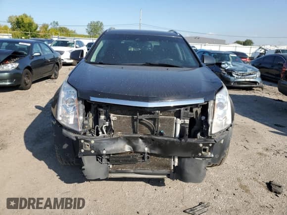 ✅ 2015 Cadillac SRX Performance Collection • VIN: 3GYFNFE33FS629992 • Lot: 82061395. Listed on Copart with 111,944 mi. Free auction sales archive from the USA and detailed vehicle history report at DreamBid. Image 5.