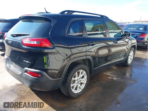 ✅ 2015 Jeep Cherokee Sport • VIN: 1C4PJLAB2FW616995 • Lot: 43384570. Listed on IAAI with 103,934 mi. Free auction sales archive from the USA and detailed vehicle history report at DreamBid. Image 4.