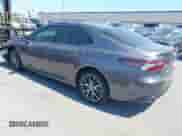 2022 Toyota Camry Hybrid XLE with VIN 4T1F31AK4NU571560, listed as a IAAI auction lot 42654973 with 10,810 mi miles and . Bid and sale history available at DreamBid. Image 3.