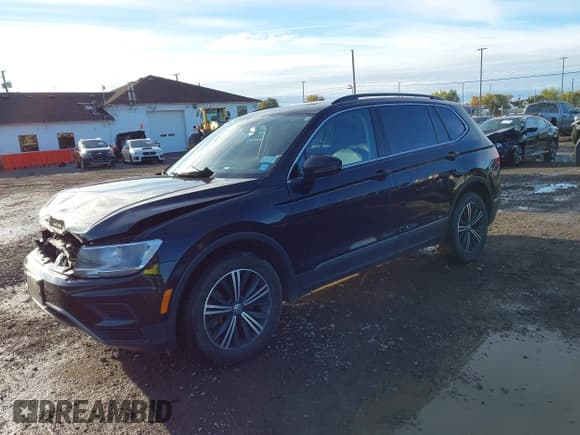 ✅ 2018 Volkswagen Tiguan SEL • VIN: 3VV2B7AX5JM133781 • Лот: 43591714. Опубликован ранее на IAAI с пробегом 87 547 миль. Бесплатный доступ к архиву аукционных продаж из США и подробный отчёт об истории автомобиля на DreamBid. Изображение 2.
