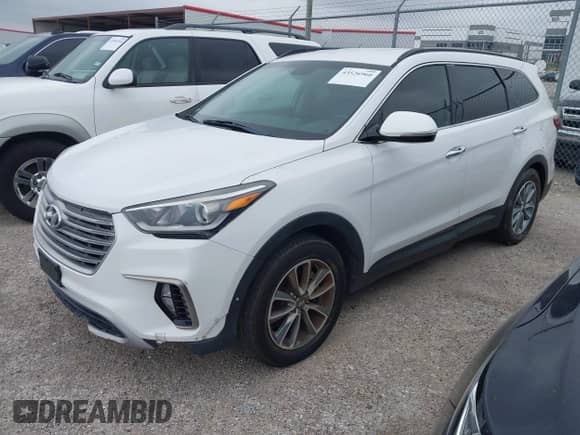 2017 Hyundai Santa Fe SE z VIN KM8SN4HF7HU241712, wystawiony jako IAAI lot #43526960 z przebiegiem 131 348 mil mil oraz . Historia ofert i sprzedaży dostępna na DreamBid. Obrazek 2.