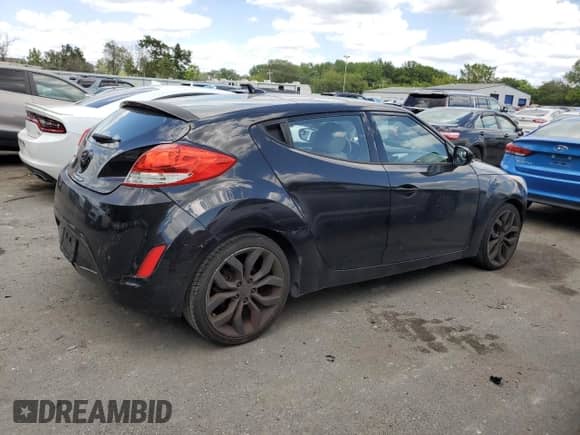 2012 Hyundai Veloster w/Gray Int с VIN KMHTC6AD8CU046631, выставлен на аукционе Copart как лот 68106965 с пробегом 120 090 миль миль и Списание • Salvage title. История ставок и продаж доступна на DreamBid. Изображение 3.