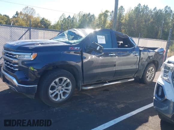 ✅ 2022 Chevrolet Silverado 1500 LTZ • VIN: 1GCUDGED5NZ602132 • Lot: 43512024. Listed on IAAI with 104,727 mi. Free auction sales archive from the USA and detailed vehicle history report at DreamBid. Image 14.