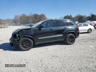 ✅ 2013 Jeep Grand Cherokee Laredo • VIN: 1C4RJFAG6DC635800 • Lot: 93049045. Listed on Copart with 145,660 mi. Free auction sales archive from the USA and detailed vehicle history report at DreamBid. Image 1.