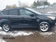 ✅ 2015 Ford Escape SE • VIN: 1FMCU0GX7FUC86673 • Lot: 43612141. Listed on IAAI with 124,543 mi. Free auction sales archive from the USA and detailed vehicle history report at DreamBid. Image 13.