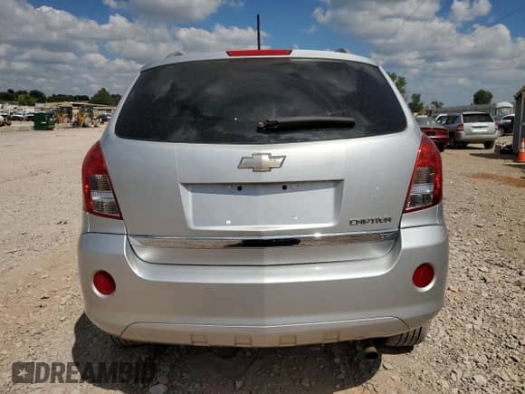 2014 Chevrolet Captiva Sport LT с VIN 3GNAL3EK7ES574397, выставлен на аукционе Copart как лот 70479704 с пробегом 160 956 миль миль и Списание • Salvage title. История ставок и продаж доступна на DreamBid. Изображение 6.