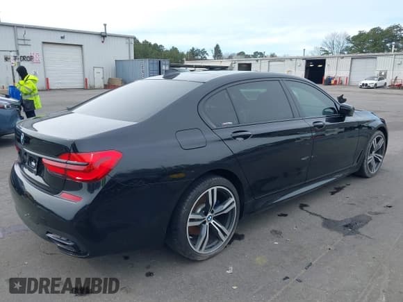 ✅ 2019 BMW 7 Series 740i • VIN: WBA7E2C57KB217973 • Lot: 39064321. Listed on IAAI with 54,818 mi. Free auction sales archive from the USA and detailed vehicle history report at DreamBid. Image 4.