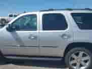 2011 Chevrolet Tahoe LTZ with VIN 1GNSKCE03BR368837, listed as a IAAI auction lot 42741642 with 166,196 mi miles and . Bid and sale history available at DreamBid. Image 14.