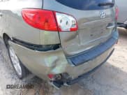 ✅ 2009 Hyundai Santa Fe SE • VIN: 5NMSH13EX9H312578 • Lot: 42863522. Listed on IAAI with 243,162 mi. Free auction sales archive from the USA and detailed vehicle history report at DreamBid. Image 6.