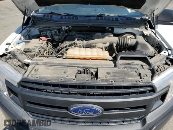 ✅ 2018 Ford F-150 XL • VIN: 1FTMF1CB1JKC01852 • Lot: 68040195. Wystawiony na Copart z przebiegiem 99 510 mil. Bezpłatny archiwum sprzedaży aukcyjnych z USA i szczegółowy raport historii pojazdu na DreamBid. Zdjęcie 11.