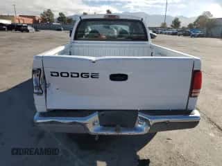 2002 Dodge Dakota SLT с VIN 1B7HL48XX2S523231, выставлен на аукционе Copart как лот 79940644 с пробегом 125 728 миль миль и Списание • Salvage title. История ставок и продаж доступна на DreamBid. Изображение 6.