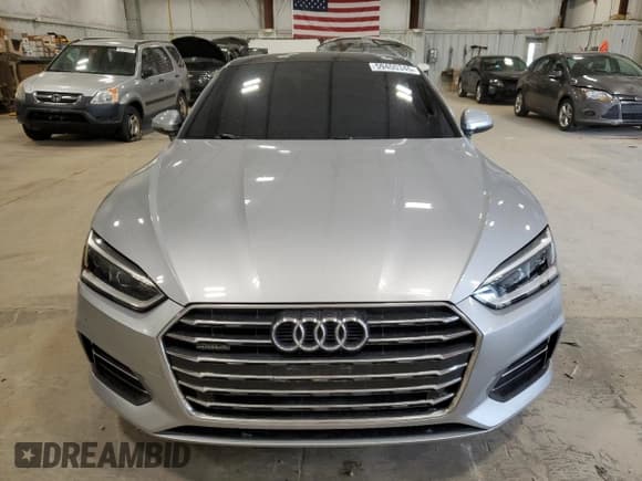 ✅ 2018 Audi A5 Premium Plus • VIN: WAUPNAF57JA058446 • Лот: 59400345. Опубликован ранее на Copart с пробегом 65 188 миль. Бесплатный доступ к архиву аукционных продаж из США и подробный отчёт об истории автомобиля на DreamBid. Изображение 5.