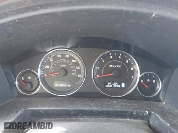 ✅ 2010 Jeep Commander Sport • VIN: 1J4RG4GK2AC127991 • Lot: 42515030. Listed on IAAI with 191,023 mi. Free auction sales archive from the USA and detailed vehicle history report at DreamBid. Image 7.