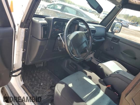 ✅ 2003 Jeep Wrangler Rubicon • VIN: 1J4FA69S73P333199 • Lot: 50602615. Listed on Copart with 133,254 mi. Free auction sales archive from the USA and detailed vehicle history report at DreamBid. Image 8.