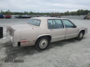 ✅ 1990 Cadillac DeVille • VIN: 1G6CD5332L4262719 • Lot: 69660295. Listed on Copart with 301,875 mi. Free auction sales archive from the USA and detailed vehicle history report at DreamBid. Image 3.