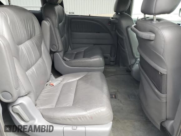 ✅ 2006 Honda Odyssey EX-L • VIN: 5FNRL38656B410666 • Лот: 80554015. Опубликован ранее на Copart с пробегом 243 001 миль. Бесплатный доступ к архиву аукционных продаж из США и подробный отчёт об истории автомобиля на DreamBid. Изображение 11.