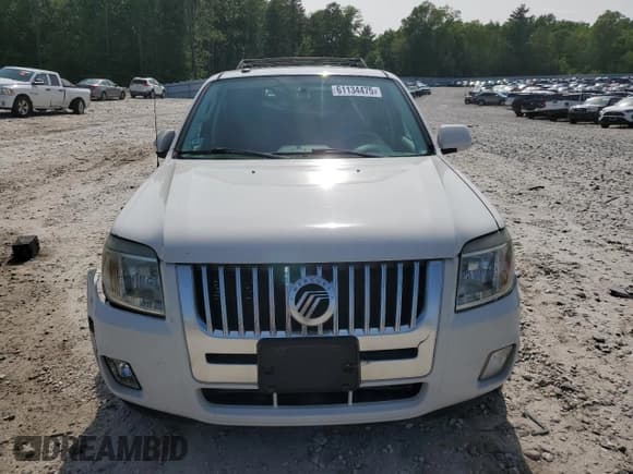 ✅ 2009 Mercury Mariner Premier • VIN: 4M2CU97G09KJ01723 • Lot: 61134475. Wystawiony na Copart z przebiegiem 105 205 mil. Bezpłatny archiwum sprzedaży aukcyjnych z USA i szczegółowy raport historii pojazdu na DreamBid. Zdjęcie 5.