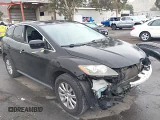 ✅ 2011 Mazda CX-7 i Sport • VIN: JM3ER2BMXB0357171 • Lot: 43698808. Listed on IAAI with 170,121 mi. Free auction sales archive from the USA and detailed vehicle history report at DreamBid. Image 1.