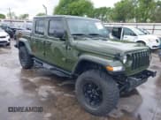 ✅ 2021 Jeep Gladiator Willys • VIN: 1C6HJTAG1ML568394 • Lot: 41895672. Listed on IAAI with 59,015 mi. Free auction sales archive from the USA and detailed vehicle history report at DreamBid. Image 1.