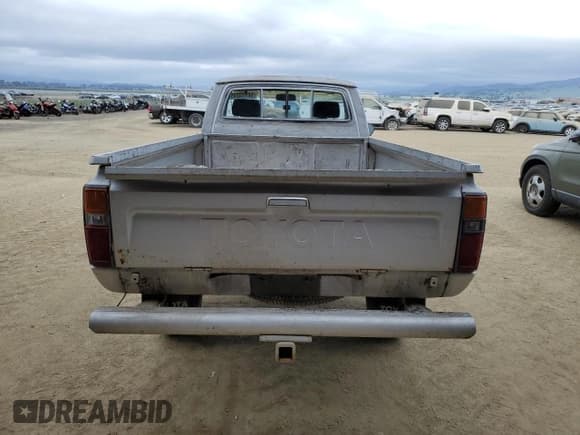 ✅ 1983 Toyota Pickup • VIN: JT4RN48S2D0070935 • Lot: 50933245. Listed on Copart with 50,699 mi. Free auction sales archive from the USA and detailed vehicle history report at DreamBid. Image 6.