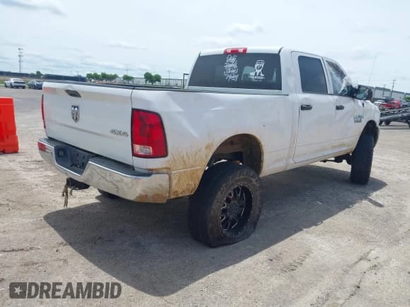 ✅ 2013 Ram 2500 Tradesman • VIN: 3C6TR5CT2DG526239 • Lot: 42150592. Listed on IAAI with 167,405 mi. Free auction sales archive from the USA and detailed vehicle history report at DreamBid. Image 4.