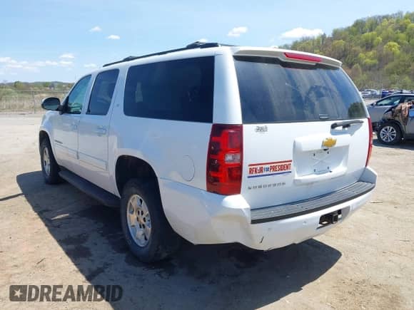 2014 Chevrolet Suburban LT z VIN 1GNSKJE70ER202460, wystawiony jako IAAI lot #42090452 z przebiegiem 181 450 mil mil oraz . Historia ofert i sprzedaży dostępna na DreamBid. Obrazek 3.