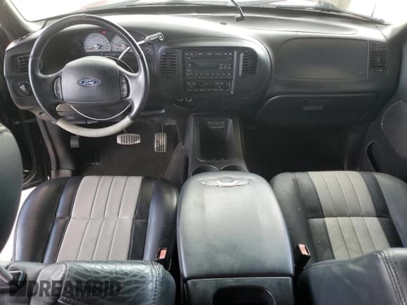 ✅ 2003 Ford F-150 Harley-Davidson • VIN: 1FTRW07383KD63595 • Lot: 59922725. Listed on Copart with 130,837 mi. Free auction sales archive from the USA and detailed vehicle history report at DreamBid. Image 8.