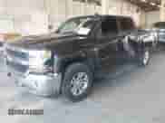 2016 Chevrolet Silverado 1500 LT with VIN 3GCUKREC6GG129840, listed as a IAAI auction lot 43088052 with 123,184 mi miles and . Bid and sale history available at DreamBid. Image 2.