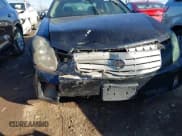 ✅ 2006 Cadillac CTS • VIN: 1G6DM57T860173814 • Lot: 43680371. Wystawiony na IAAI z przebiegiem 132 037 mil. Bezpłatny archiwum sprzedaży aukcyjnych z USA i szczegółowy raport historii pojazdu na DreamBid. Zdjęcie 6.