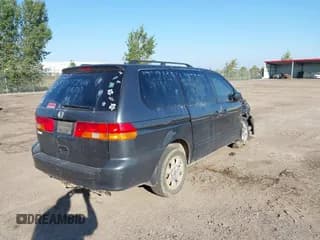 ✅ 2003 Honda Odyssey EX-L • VIN: 5FNRL18953B158878 • Лот: 43257853. Опубликован ранее на IAAI с пробегом 231 593 миль. Бесплатный доступ к архиву аукционных продаж из США и подробный отчёт об истории автомобиля на DreamBid. Изображение 4.