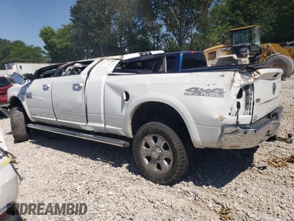 ✅ 2018 Ram 2500 Laramie • VIN: 3C6UR5NJ3JG252142 • Lot: 58724454. Listed on Copart with 99,079 mi. Free auction sales archive from the USA and detailed vehicle history report at DreamBid. Image 2.