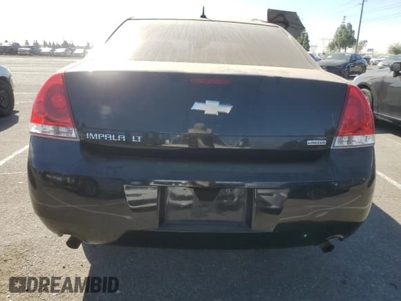 ✅ 2014 Chevrolet Impala LT • VIN: 2G1WB5E38E1109945 • Лот: 77792664. Опубликован ранее на Copart с пробегом 179 377 миль. Бесплатный доступ к архиву аукционных продаж из США и подробный отчёт об истории автомобиля на DreamBid. Изображение 6.