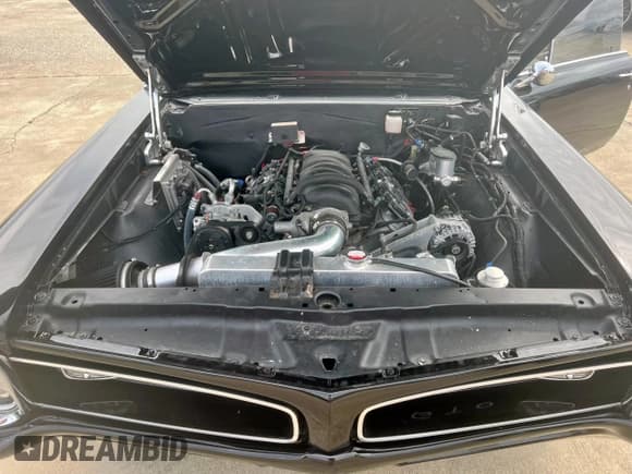 ✅ 1966 Pontiac GTO • VIN: 242176Z116279 • Лот: 67152105. Опубликован ранее на Copart с пробегом 2 145 миль. Бесплатный доступ к архиву аукционных продаж из США и подробный отчёт об истории автомобиля на DreamBid. Изображение 7.