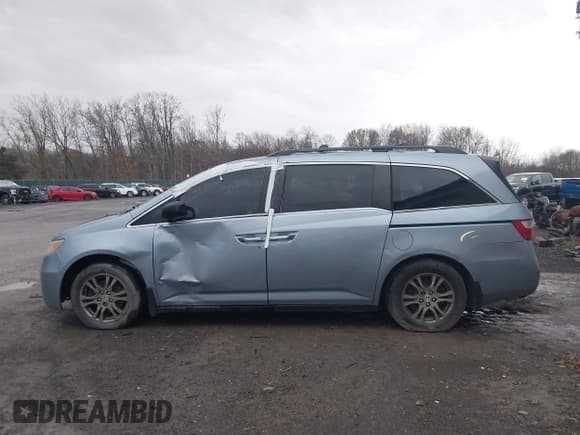 ✅ 2012 Honda Odyssey EX • VIN: 5FNRL5H44CB072084 • Лот: 43664738. Опубликован ранее на IAAI с пробегом 169 907 миль. Бесплатный доступ к архиву аукционных продаж из США и подробный отчёт об истории автомобиля на DreamBid. Изображение 14.