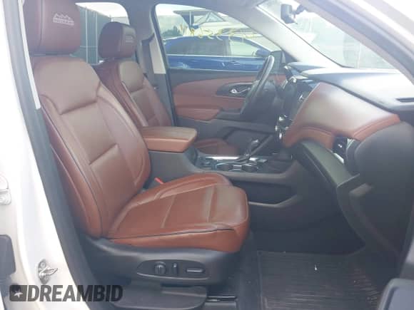 2018 Chevrolet Traverse High Country z VIN 1GNEVKKW3JJ107938, wystawiony jako IAAI lot #43356811 z przebiegiem 76 017 mil mil oraz . Historia ofert i sprzedaży dostępna na DreamBid. Obrazek 5.