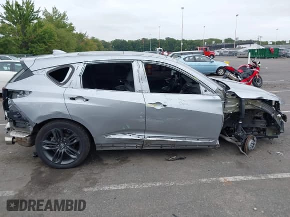 ✅ 2023 Acura RDX w/A-Spec Package • VIN: 5J8TC2H65PL021915 • Lot: 43173523. Wystawiony na IAAI z przebiegiem 27 276 mil. Bezpłatny archiwum sprzedaży aukcyjnych z USA i szczegółowy raport historii pojazdu na DreamBid. Zdjęcie 18.