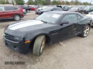 ✅ 2013 Chevrolet Camaro LT • VIN: 2G1FC1E35D9140852 • Lot: 43772311. Listed on IAAI with 154,885 mi. Free auction sales archive from the USA and detailed vehicle history report at DreamBid. Image 2.