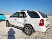 ✅ 2003 Acura MDX Touring • VIN: 2HNYD18693H527700 • Lot: 84438275. Wystawiony na Copart z przebiegiem 274 349 mil. Bezpłatny archiwum sprzedaży aukcyjnych z USA i szczegółowy raport historii pojazdu na DreamBid. Zdjęcie 2.