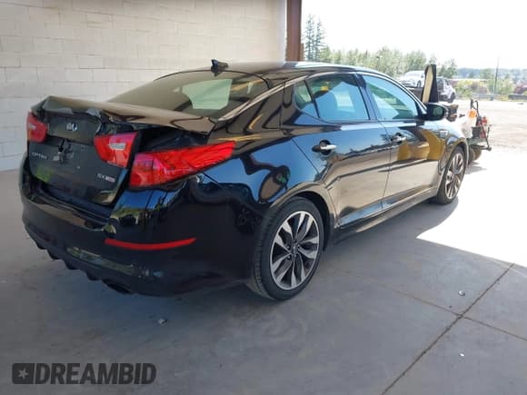 ✅ 2014 Kia Optima SX Turbo • VIN: 5XXGR4A65EG262195 • Lot: 42369500. Listed on IAAI with 163,009 mi. Free auction sales archive from the USA and detailed vehicle history report at DreamBid. Image 4.