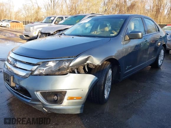 ✅ 2011 Ford Fusion Hybrid • VIN: 3FADP0L31BR178592 • Lot: 41800821. Listed on IAAI with 57,054 mi. Free auction sales archive from the USA and detailed vehicle history report at DreamBid. Image 17.