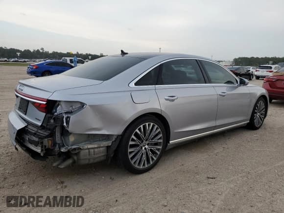 ✅ 2019 Audi A8 • VIN: WAU8DAF85KN015896 • Лот: 49845614. Опубликован ранее на Copart с пробегом 42 659 миль. Бесплатный доступ к архиву аукционных продаж из США и подробный отчёт об истории автомобиля на DreamBid. Изображение 3.